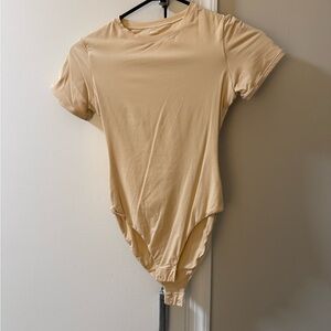 SKIMS Short-Sleeve Crew Neck Bodysuit in Sand